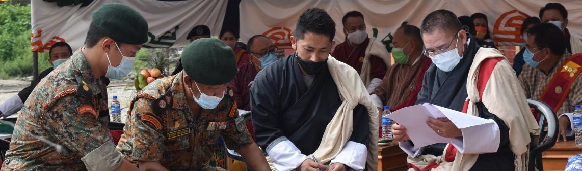 Dasho(s) and officials signing the Handing taking 