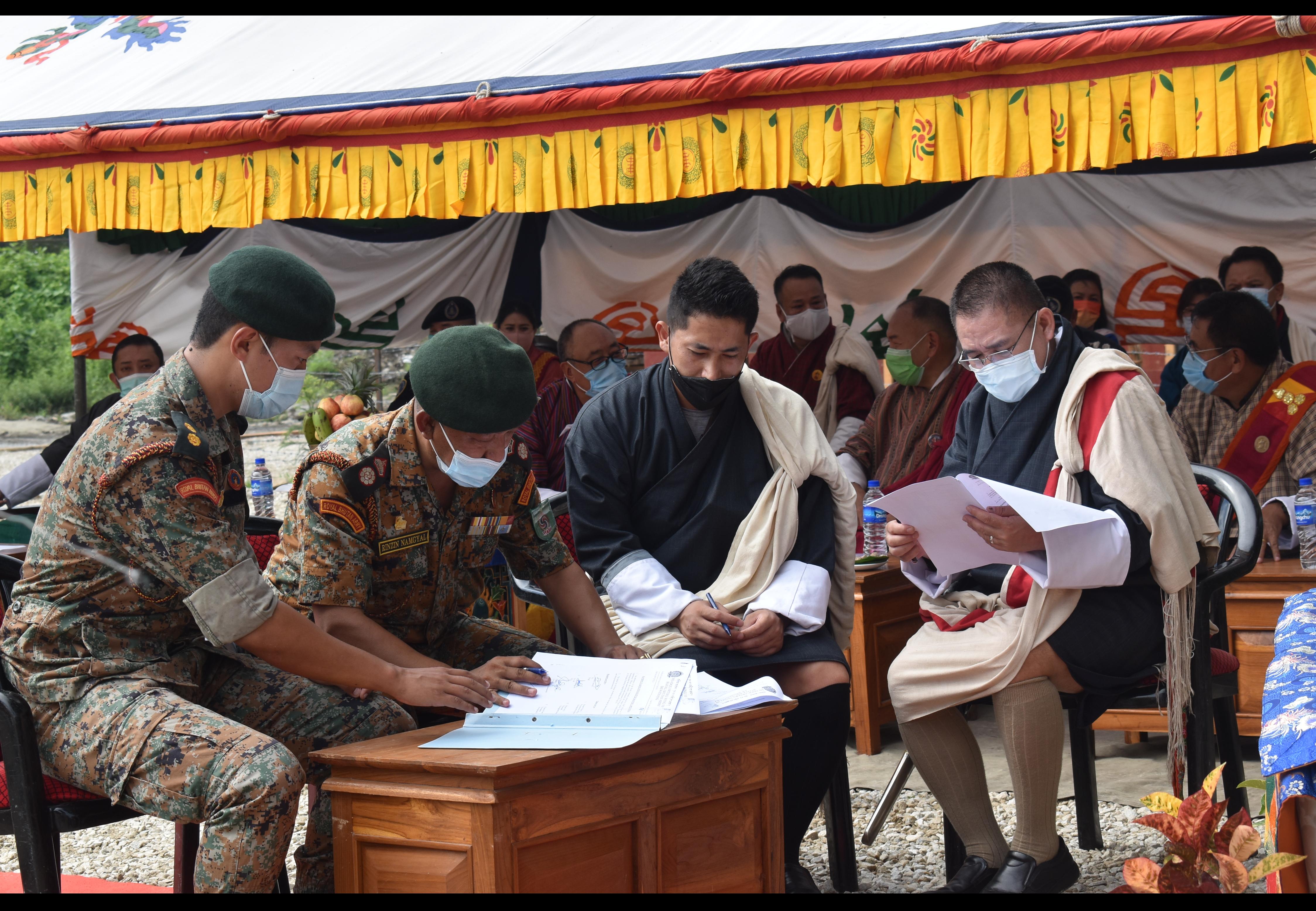 Dasho(s) and officials signing the Handing taking 